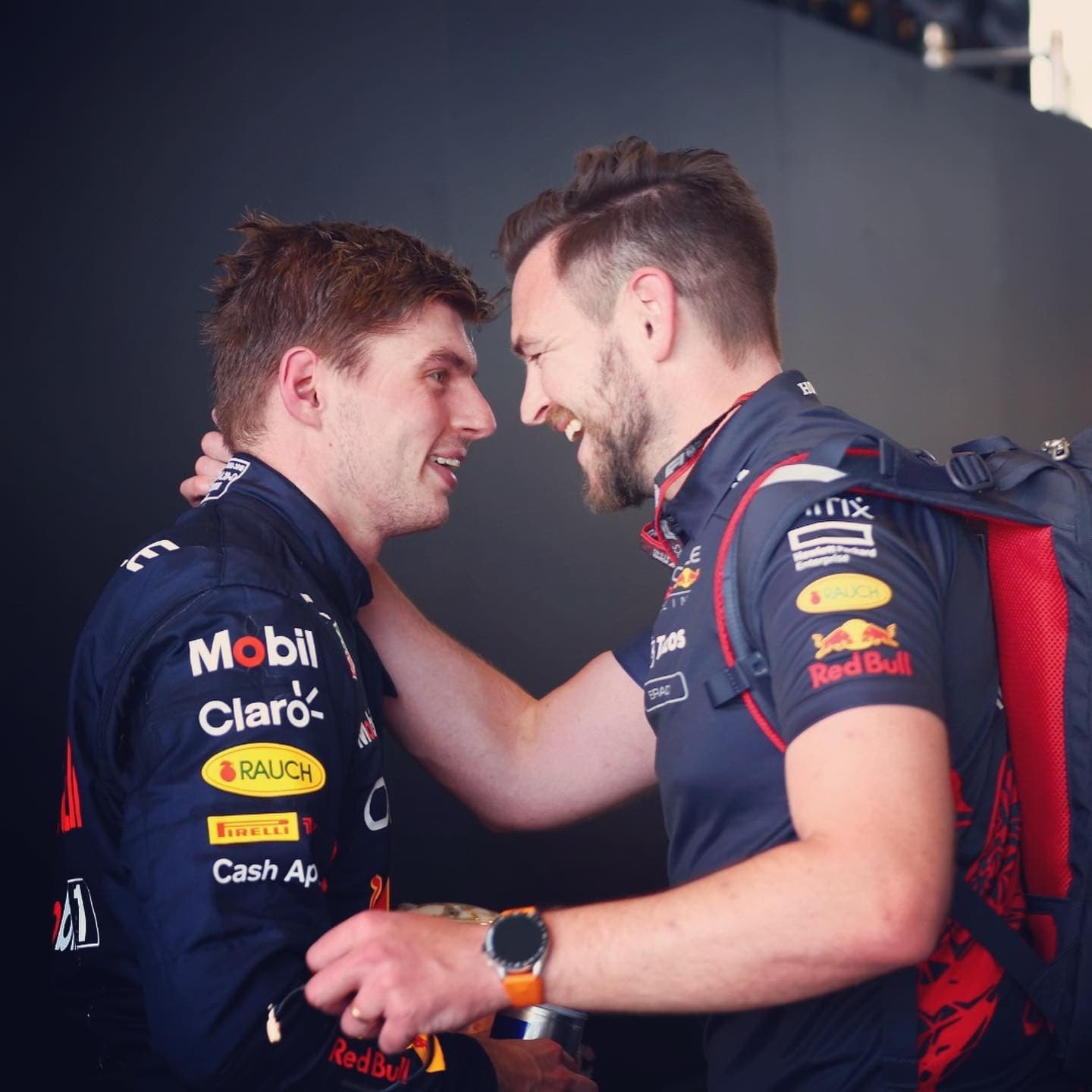 Brad celebrating with his driver after a race