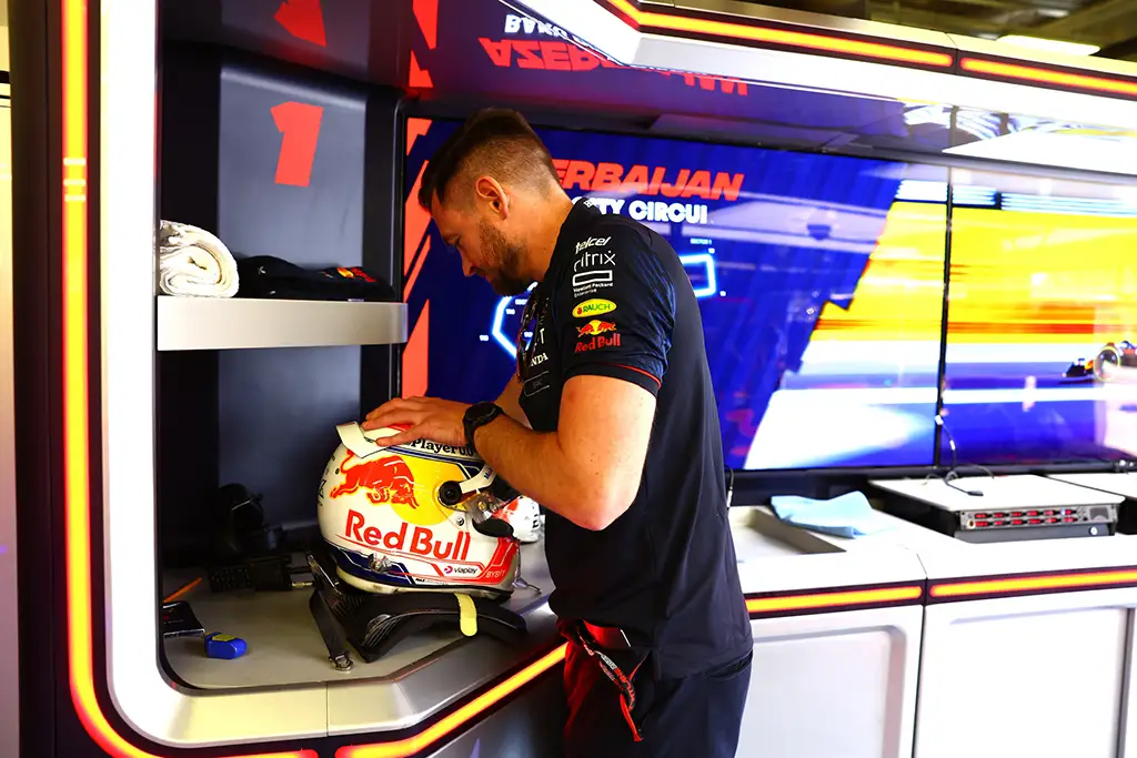 Azerbaijan Grand Prix - Bradley Scanes prepares Red Bull's Max Verstappen's helmet and visor for the race in Baku